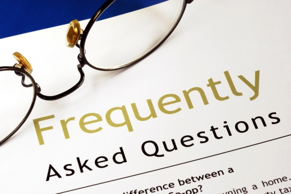 frequently asked questions printed on paper depicting furnace vs electrical heat pump FAQs