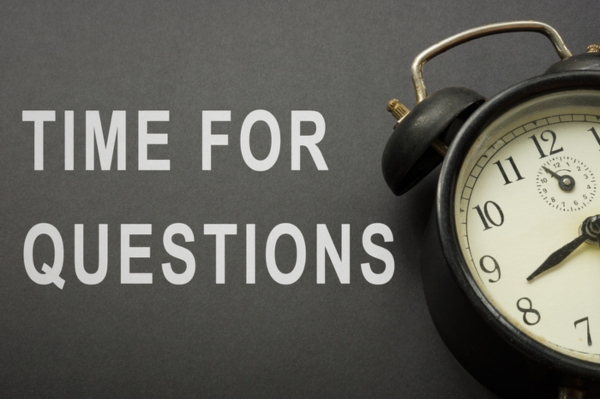 time for questions beside an alarm clock depicting FAQs