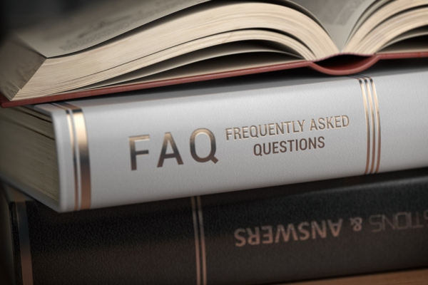 Book labeled with FAQ frequently asked questions depicting supplemental ductless heating