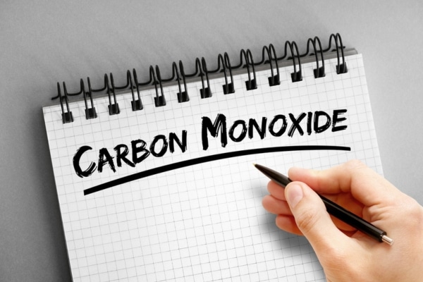 carbon monoxide written on a notebook depicting its basic formation and hazards