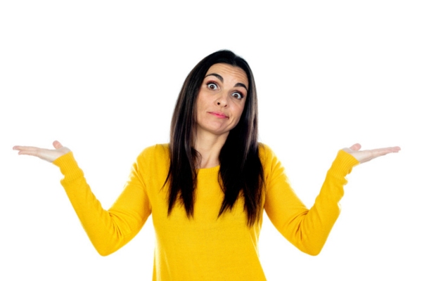 woman with both hands raised on the side wondering the difference between single-speed and variable-speed furnaces