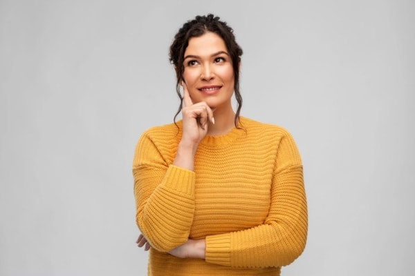 image of a thinking woman depicting deciding on heating system repair